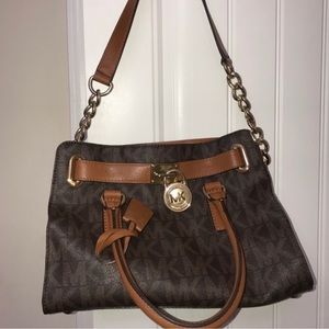 Michael Kors crossbody,or hand bag.